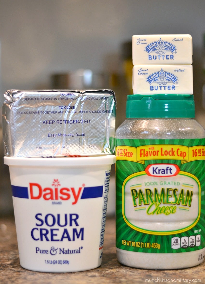 The creamy ingredients that go into low carb, keto-friendly mashed cauliflower recipe: cream cheese, sour cream, butter, grated parmesan cheese