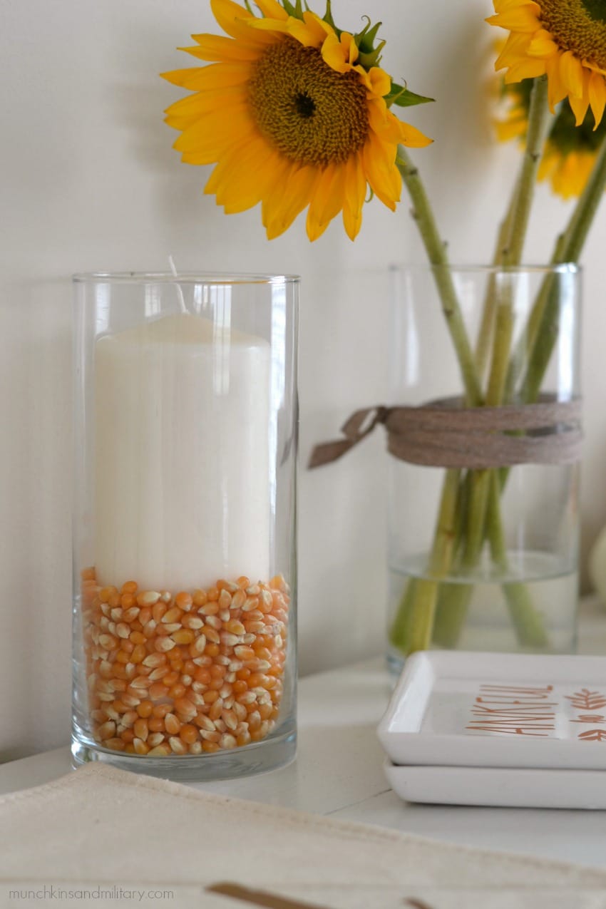 Fall home decor - a candle and corn in a dollar tree vase