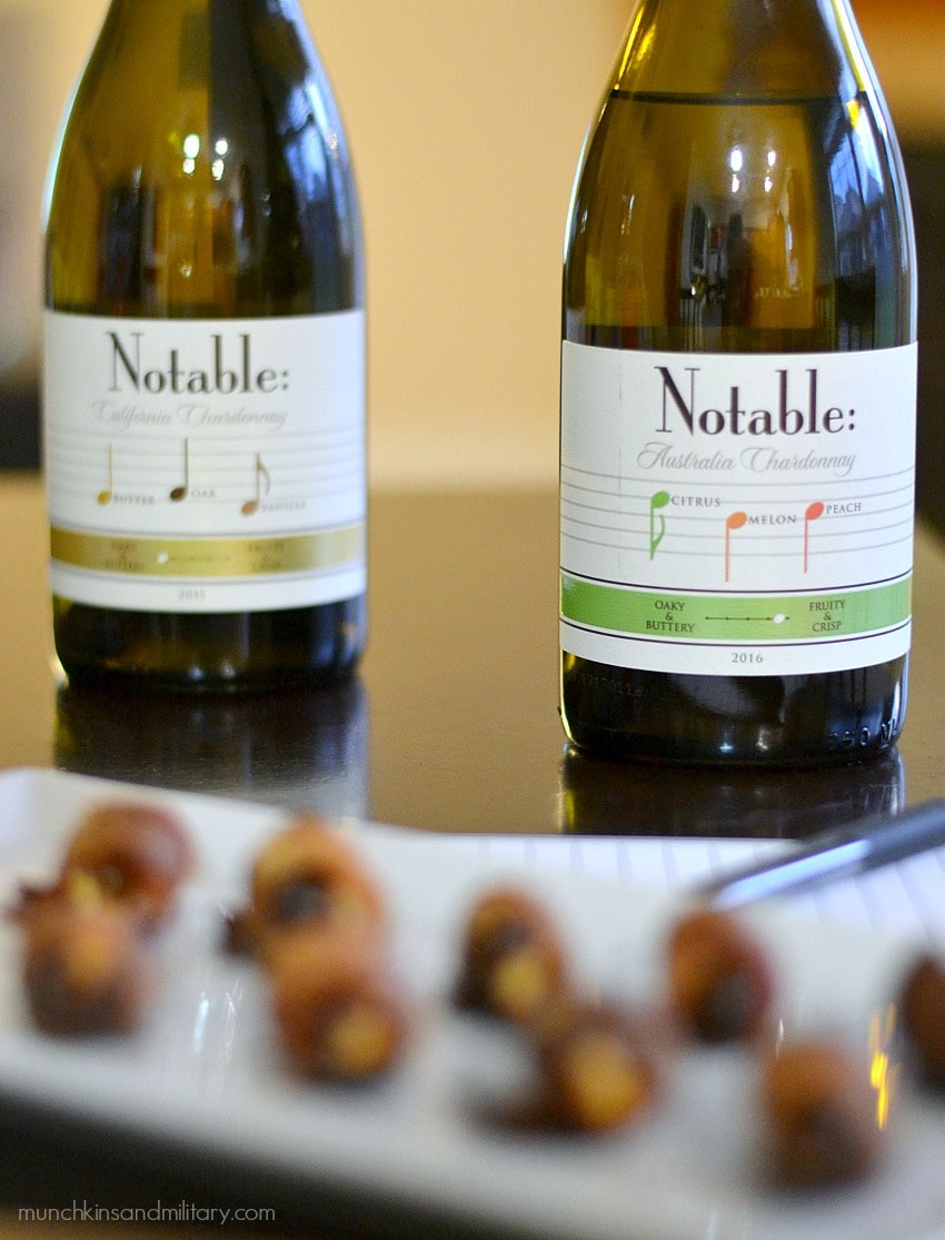 Two Notable wine bottles with bacon-wrapped goat cheese stuffed dates