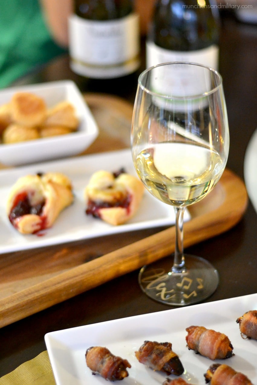 All the makings for a perfect wine night! Chardonnay wine paired with bacon wrapped goat cheese dates, cranberry tartlets, and puff pastry