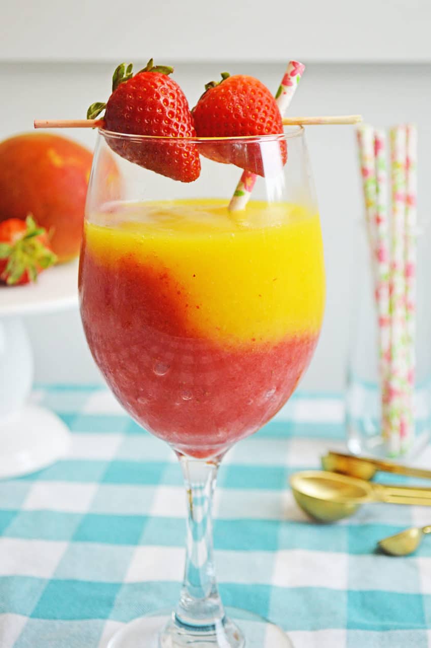 Fresh mango and strawberry come together to create the perfect summer cocktail! - Mango Strawberry Daiquiri Recipe