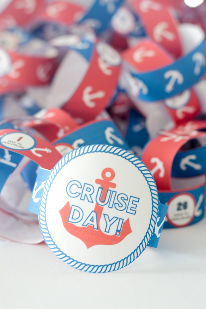 Red and blue paper chain countdown in a pile, with "cruise day" link showing in front