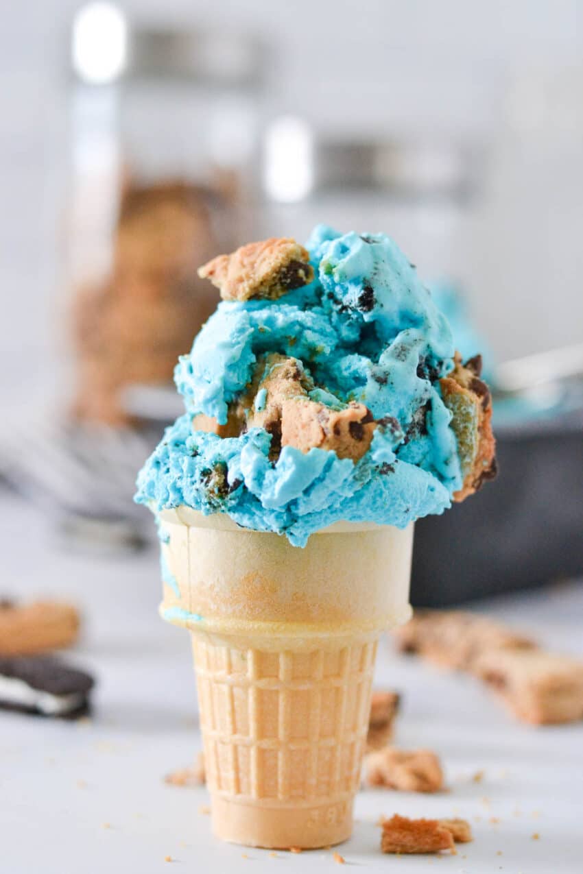 Scoop of blue cookie monster ice cream on a cake cone